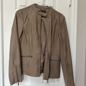 Full zipper Faux leather jacket.